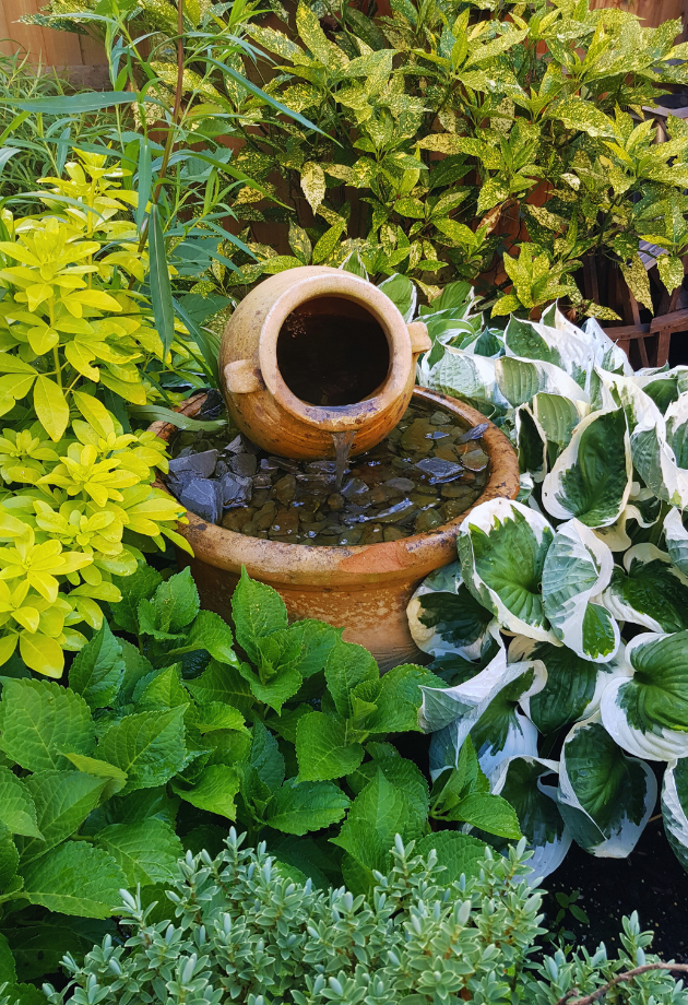 small clay pot water fountain